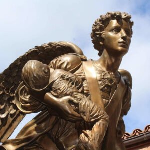 angel-baby-child-statue-memorial-unborn-shrine-our-lady-guadalupe-church-la-crosse-wisconsin-gallery Statue of an angel carrying a baby at Our Lady of Guadalupe Shrine in La Crosse, Wisconsin.
