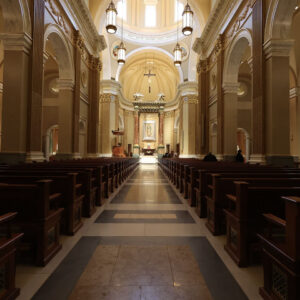 church-interior-decoration-pews-shrine-our-lady-guadalupe-church-la-crosse-wisconsin-gallery Pews leading to the altar of the church at Our Lady of Guadalupe Shrine in La Crosse, Wisconsin.