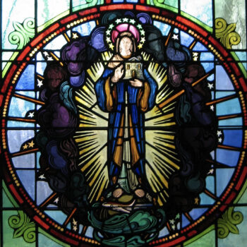 stained-glass-window-close-upvotive-candle-chapel-shrine-our-lady-guadalupe-church-la-crosse-wisconsin-gallery Stained glass window in the votive candle chapel at Our Lady of Guadalupe Shrine in La Crosse, Wisconsin.