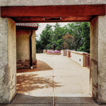 walkway-pilgrim-center-shrine-our-lady-guadalupe-church-la-crosse-wisconsin-gallery Walkway path leading to the statue of Juan Diego at Our Lady of Guadalupe Shrine in La Crosse, Wisconsin.
