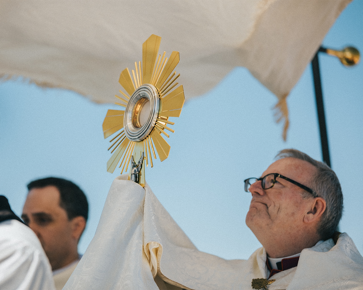 Bishop Robert Barron processing with the Eucharist National Eucharistic Pilgrimage Image of Eucharistic Procession In La Crosse, Wisconsin