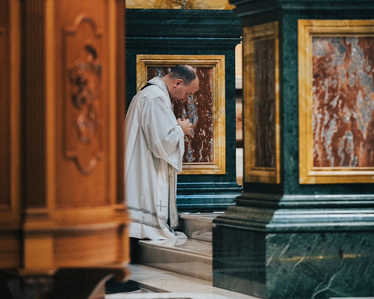 Father Check Praying before Eucharistic talk at The Guadalupe Shrine Father Check Praying before Eucharistic talk at The Guadalupe Shrine