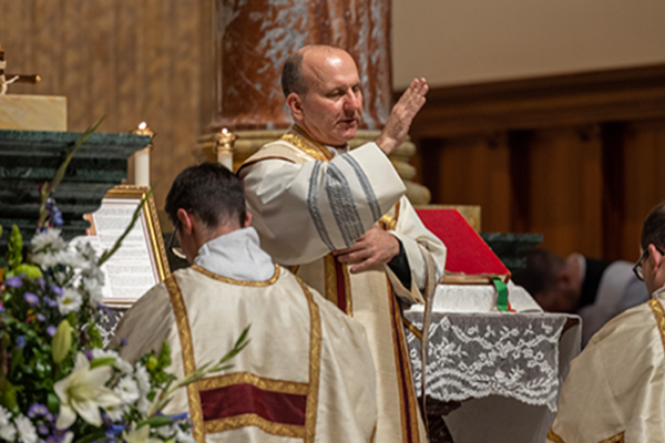 Fr. Check priest blessing in a Catholic church Fr. Check priest blessing in a Catholic church