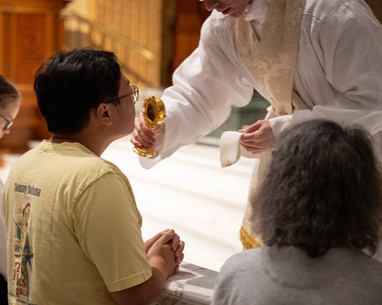 Kissing a relic in veneration Kissing a relic in veneration