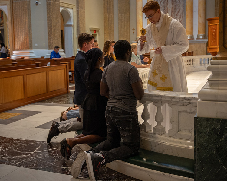 Receiving a blessing from a relic at the Guadalupe Shrine Receiving a blessing from a relic at the Guadalupe Shrine