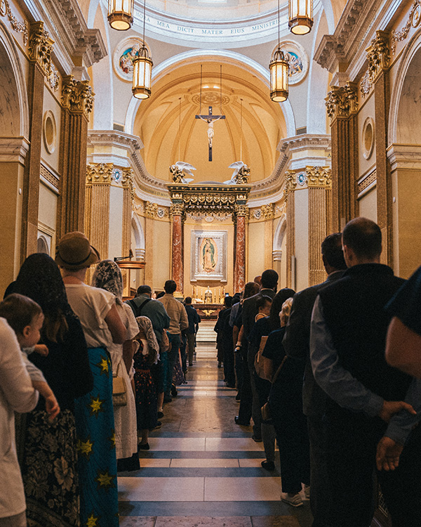 communion line leading to the Altar of Sacrifice at the Shrine of Our Lady of Guadalupe communion line leading to the Altar of Sacrifice at the Shrine of Our Lady of Guadalupe