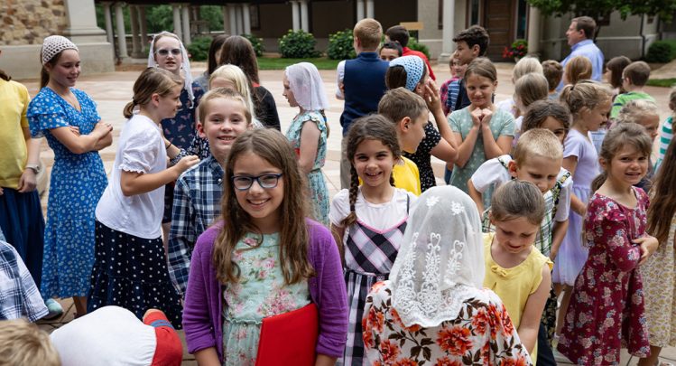 choir camp at the shrine of our lady of guadalupe children gathered with their folders