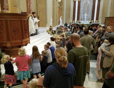 Congregation members participate in a prayer during mass at Our Lady of Guadalupe Shrine in La Crosse, Wisconsin. Congregation members participate in a prayer during mass at Our Lady of Guadalupe Shrine in La Crosse, Wisconsin.